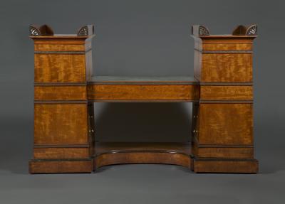Regency flash mahogany and ebonized desk of double pylon architectural form