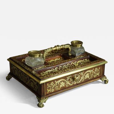 Regency rosewood and inlaid brass desk stand