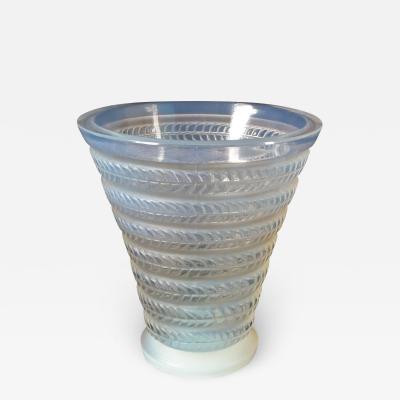 https://cdn.incollect.com/sites/default/files/medium/Ren-Lalique-Lalique-Co-Rene-Lalique-Opalescent-Glass-Cytise-Vase-426947-1765782.jpg