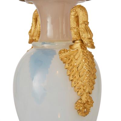 Restauration Period opaline glass three piece clock set by de Boussiard