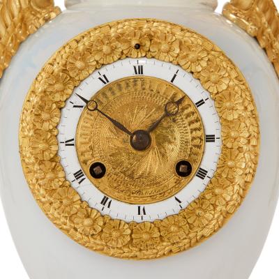 Restauration Period opaline glass three piece clock set by de Boussiard