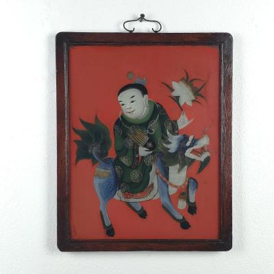 Reverse Glass Painting of a Boy Riding a Qilin China circa 1920