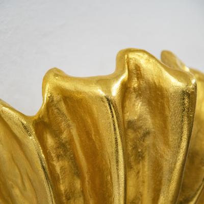 Robert Goossens Shell shaped wall light in gilded bronze