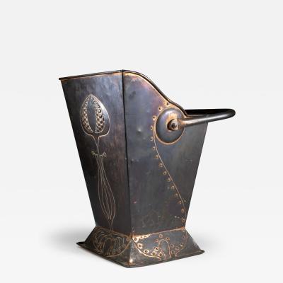 Robert Hilton Robert Hilton An Arts Crafts Copper Coal Bucket with a Single Flower in Seed