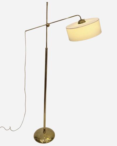 Robert Mathieu Polished brass floor lamp in the style of Robert Mathieu France circa 1950