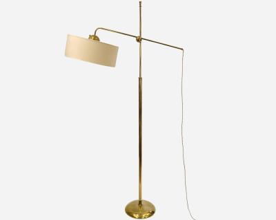 Robert Mathieu Polished brass floor lamp in the style of Robert Mathieu France circa 1950
