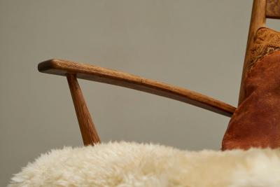 Rocking Chair in Solid Oak and Sheepskin France 1960s