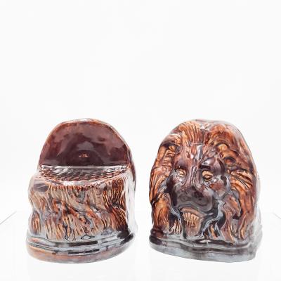 Rockingham Treacle Brown Glazed Lion Portraits A Pair
