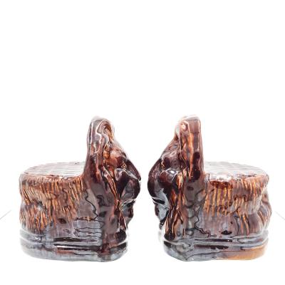 Rockingham Treacle Brown Glazed Lion Portraits A Pair