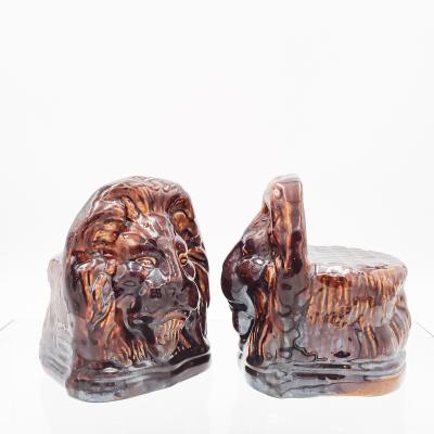 Rockingham Treacle Brown Glazed Lion Portraits A Pair