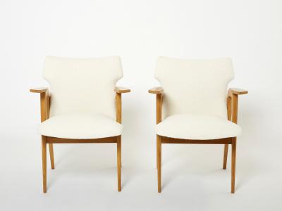 Roger Landault Roger Landault French oak compass armchairs wool boucl 1950s