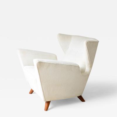 Romano Boico Rare modernist armchair in padded wood covered in fabric 