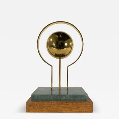 Round Sculpture in Brass with Rectangular Base
