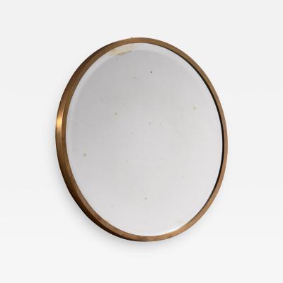Round brass wall mirror