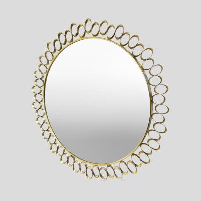 Round sculptural brass midcentury style mirror