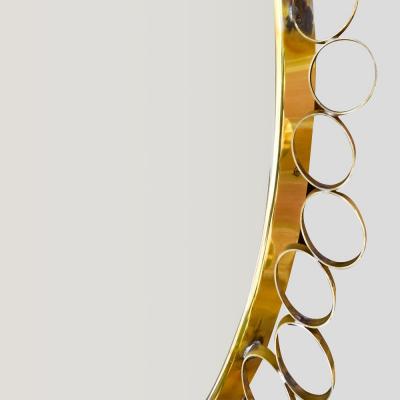 Round sculptural brass midcentury style mirror