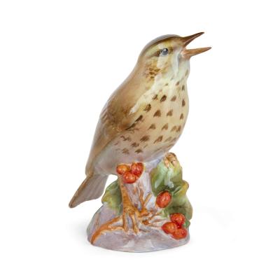 Royal Worcester Two Royal Worcester porcelain bird models of a kingfisher and a thrush