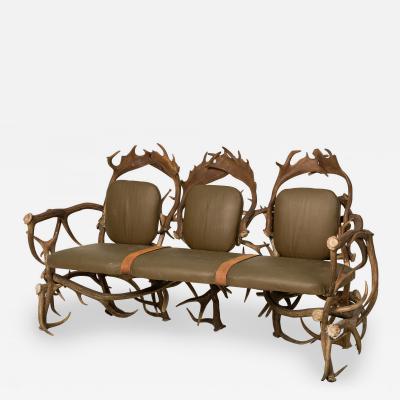 Rustic Continental Style Green Leather and Faux Antler Three Seat Settee