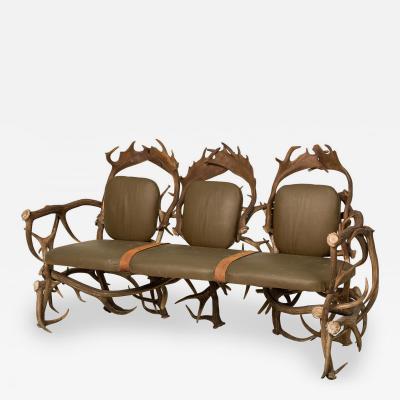 Rustic Continental Style Green Leather and Faux Antler Three Seat Settee