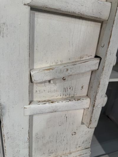 Rustic Whitewashed Wooden Armoire with Geometric Relief Doors