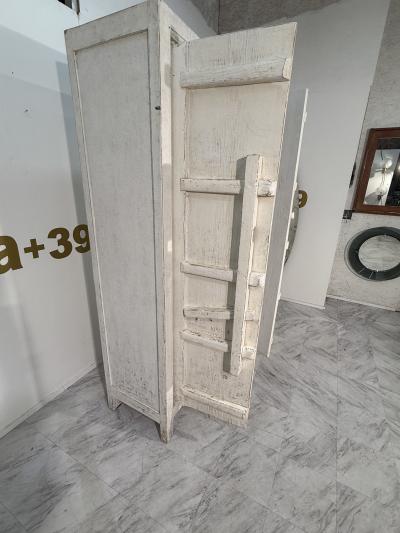Rustic Whitewashed Wooden Armoire with Geometric Relief Doors