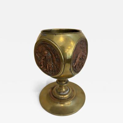 Rustic brass container with 4 copper medalions