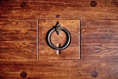 Rustic solid oak table with wrought iron details 