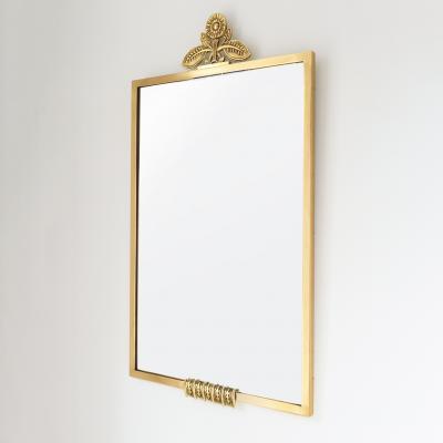 SCANDINAVIAN MODERN SWEDISH POLISHED BRASS MIRROR WITH FLOWER CROWN