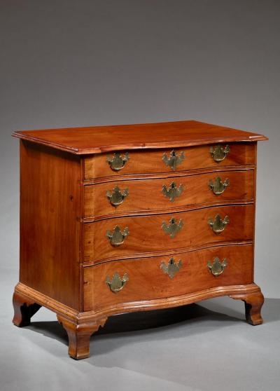 SERPENTINE CHEST WITH OGEE FEET AND BLOCKED ENDS