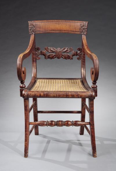 SET OF EIGHT FIGURED MAPLE ARMCHAIRS