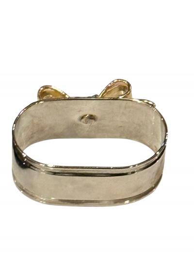 SET OF EIGHT SIVERPLATE GOLDTONE BOW DESIGN NAPKIN RINGS