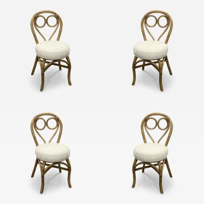 SET OF FOUR VINTAGE RATTAN CHAIRS