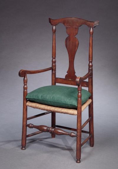 SHAPED CREST ARM CHAIR WITH NOTCHED EARS