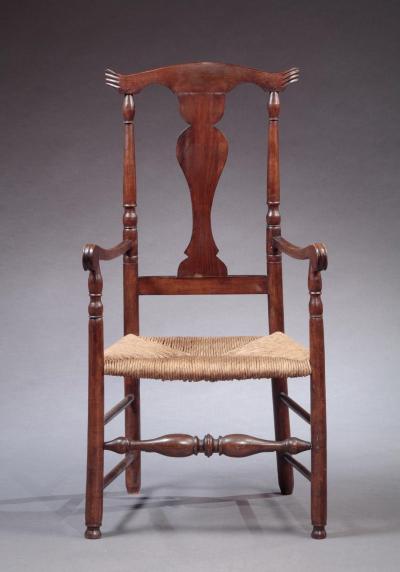 SHAPED CREST ARM CHAIR WITH NOTCHED EARS