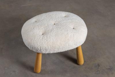 SHEEPSKIN UPHOLSTERED OTTOMAN