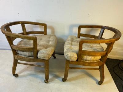 SUITE OF FOUR MODERN OLIVE WOOD DINING CHAIRS ON CASTERS