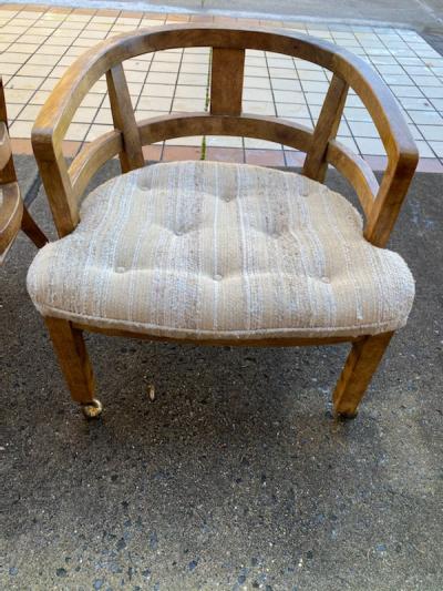 SUITE OF FOUR MODERN OLIVE WOOD DINING CHAIRS ON CASTERS
