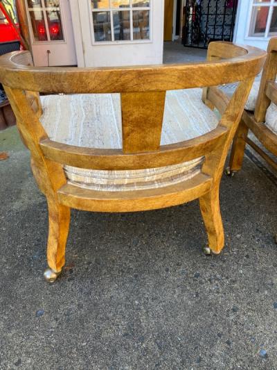SUITE OF FOUR MODERN OLIVE WOOD DINING CHAIRS ON CASTERS