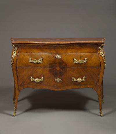 SUPERBLY DRAWN AND PROPORTIONED PAIR OF WALNUT AND GILT BRONZE MOUNTED COMMODES