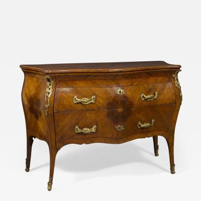 SUPERBLY DRAWN AND PROPORTIONED PAIR OF WALNUT AND GILT BRONZE MOUNTED COMMODES