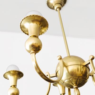 SWEDISH ART DECO BRASS CHANDELIER WITH 5 INVERTED ARCHED ARMS