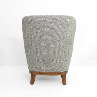 SWEDISH ART DECO LOUNGE CHAIR WITH CARVED MAHOGANY BASE