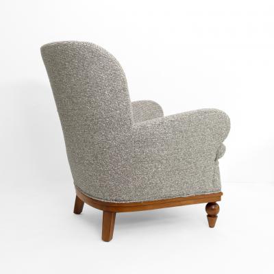 SWEDISH ART DECO LOUNGE CHAIR WITH CARVED MAHOGANY BASE