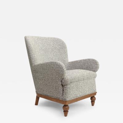 SWEDISH ART DECO LOUNGE CHAIR WITH CARVED MAHOGANY BASE