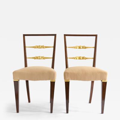 SWEDISH ART DECO PAIR OF MAHOGANY CHAIRS WITH CARVED GILT WOOD BACK RAILS