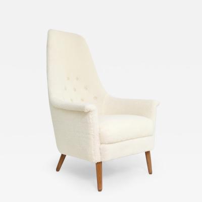 SWEDISH HIGH BACK LOUNGE CHAIR IN FAUX SHEEPSKIN