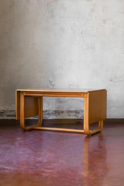 Sabatin bamboo table with extendable wooden shelf and leather bindings