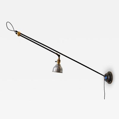 Sang Pil Bae Ball joint wall lamp