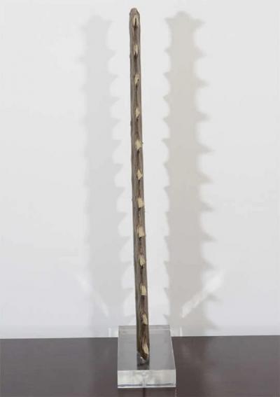 Sawtooth on Lucite display stand