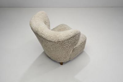 Scandinavian Easy Chairs in Sheepskin with Ottomans Scandinavia ca 1950s